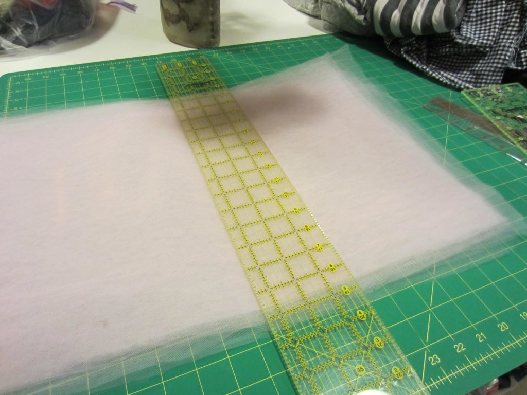 Cutting the tulle into 3" strips