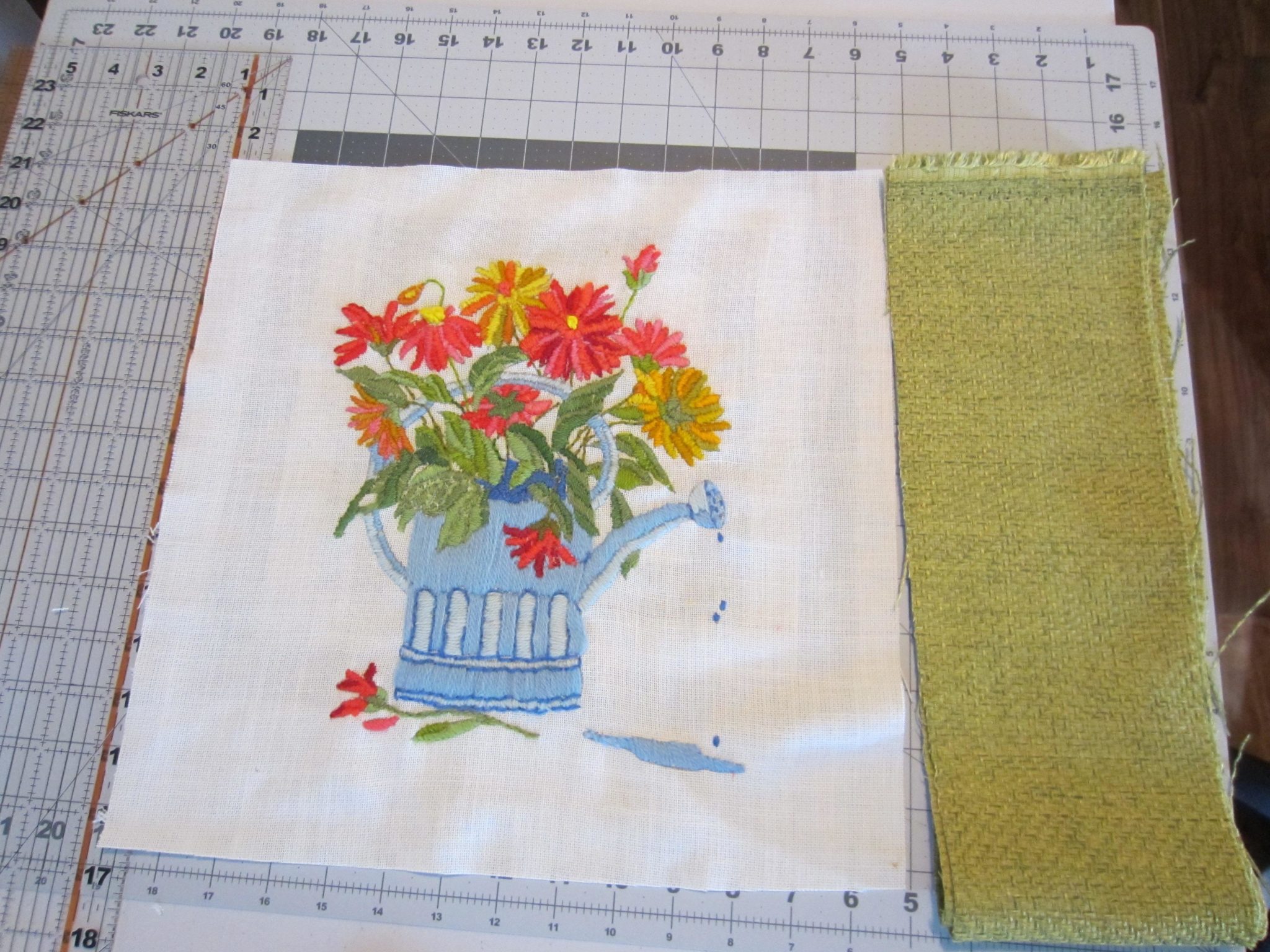Adding fabric to the piece to make the pillow top