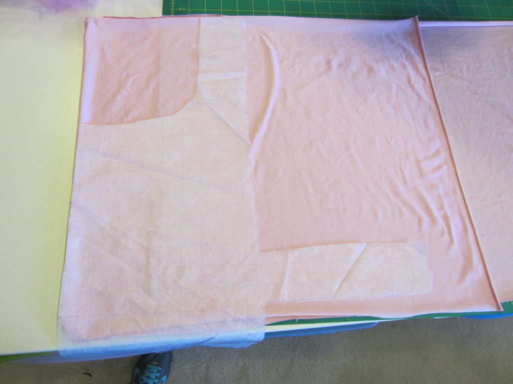 laying out the dog pattern on some spandex