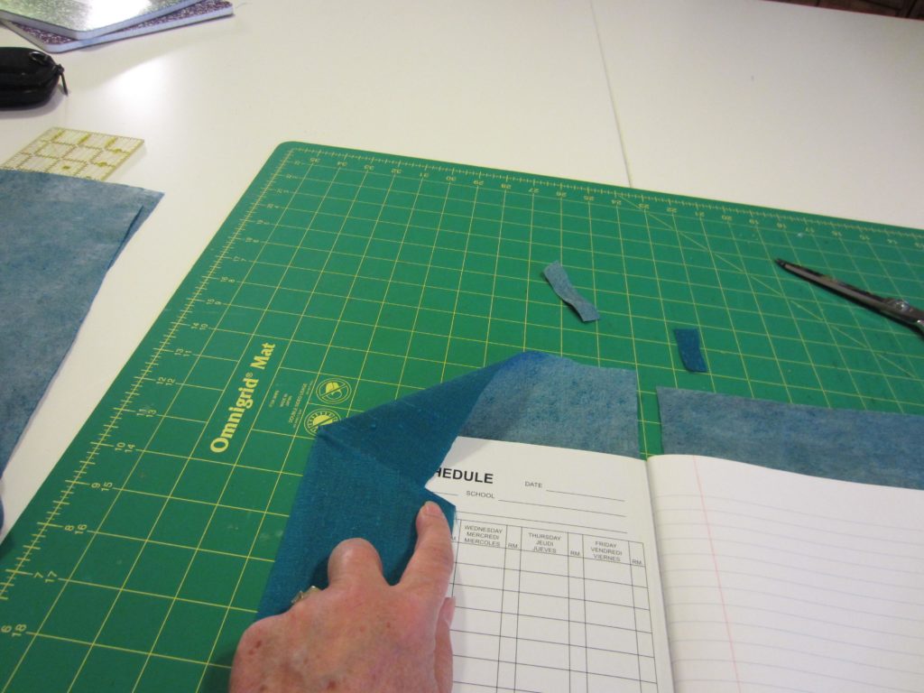 Fold the fabric inside the cover