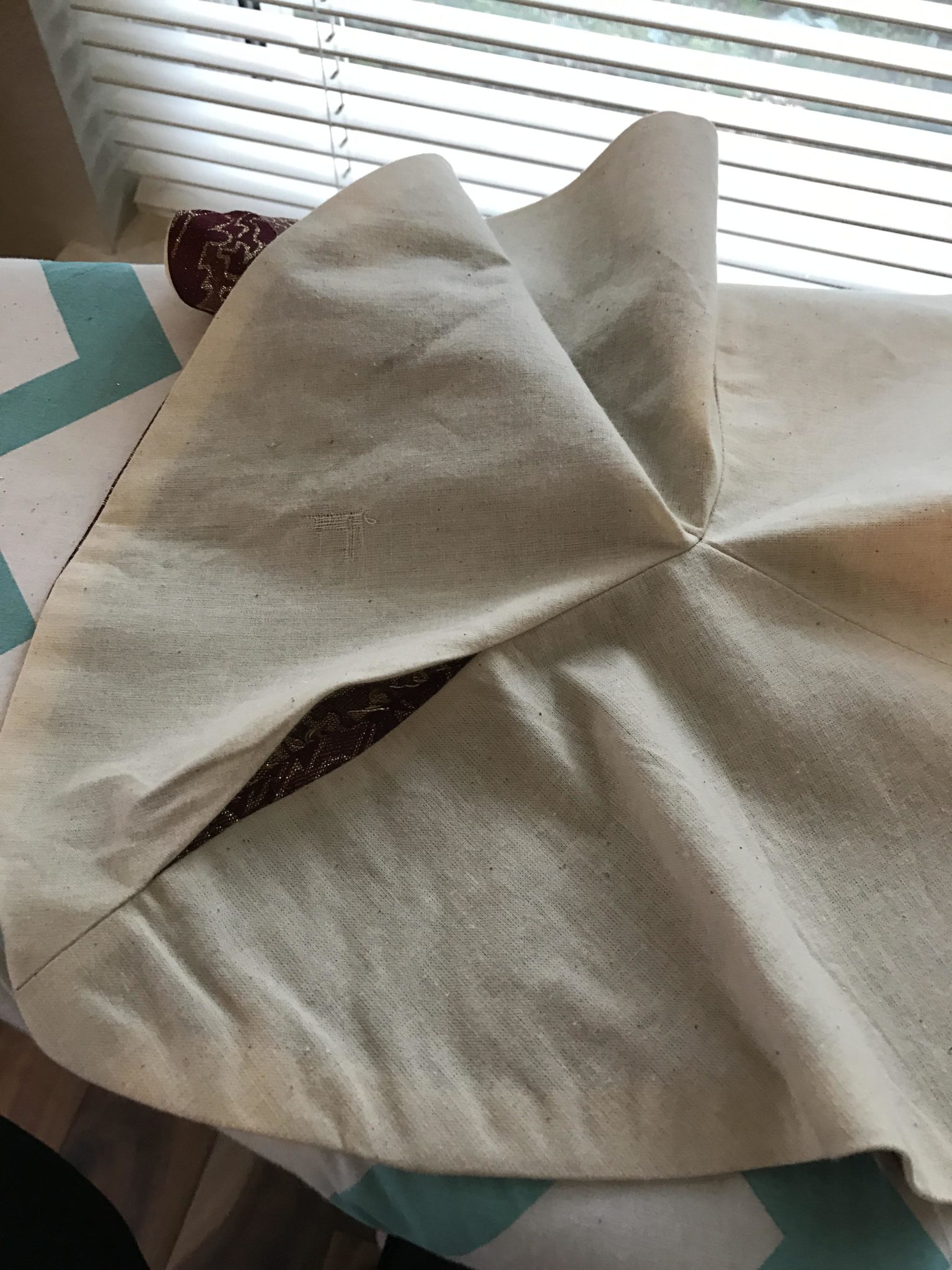 The two layers sewn together wrong sides out with a opening to turn right side out and press