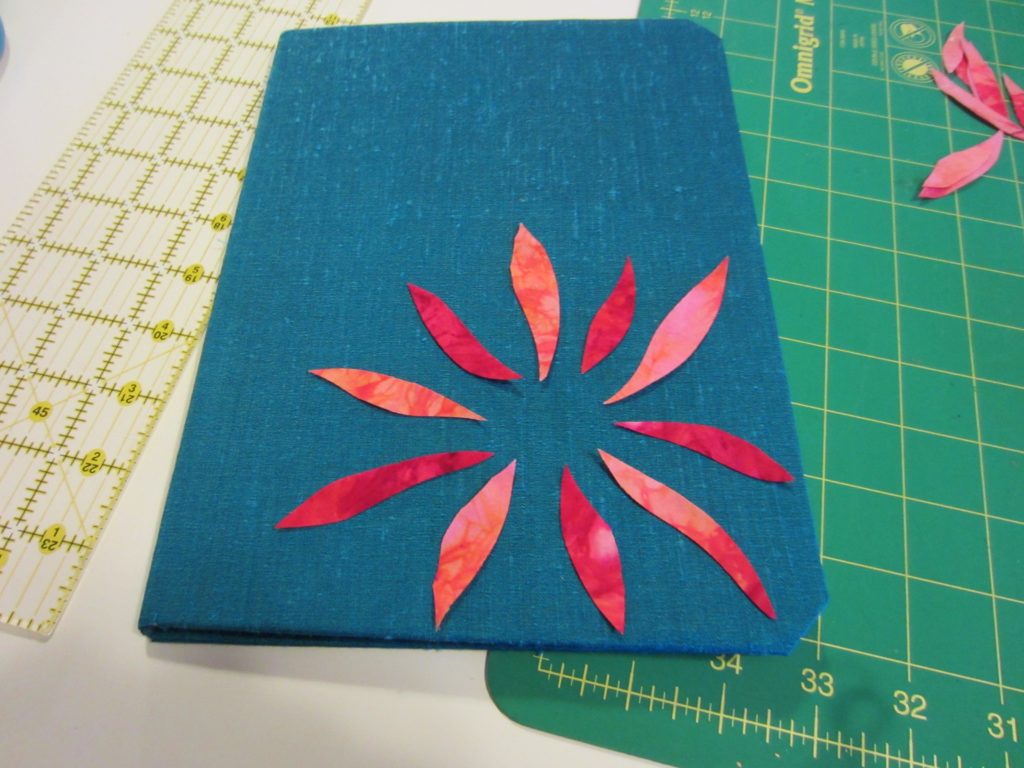 Placing the flowers on the cover