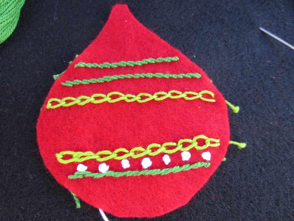 Added some French knots to the ornament