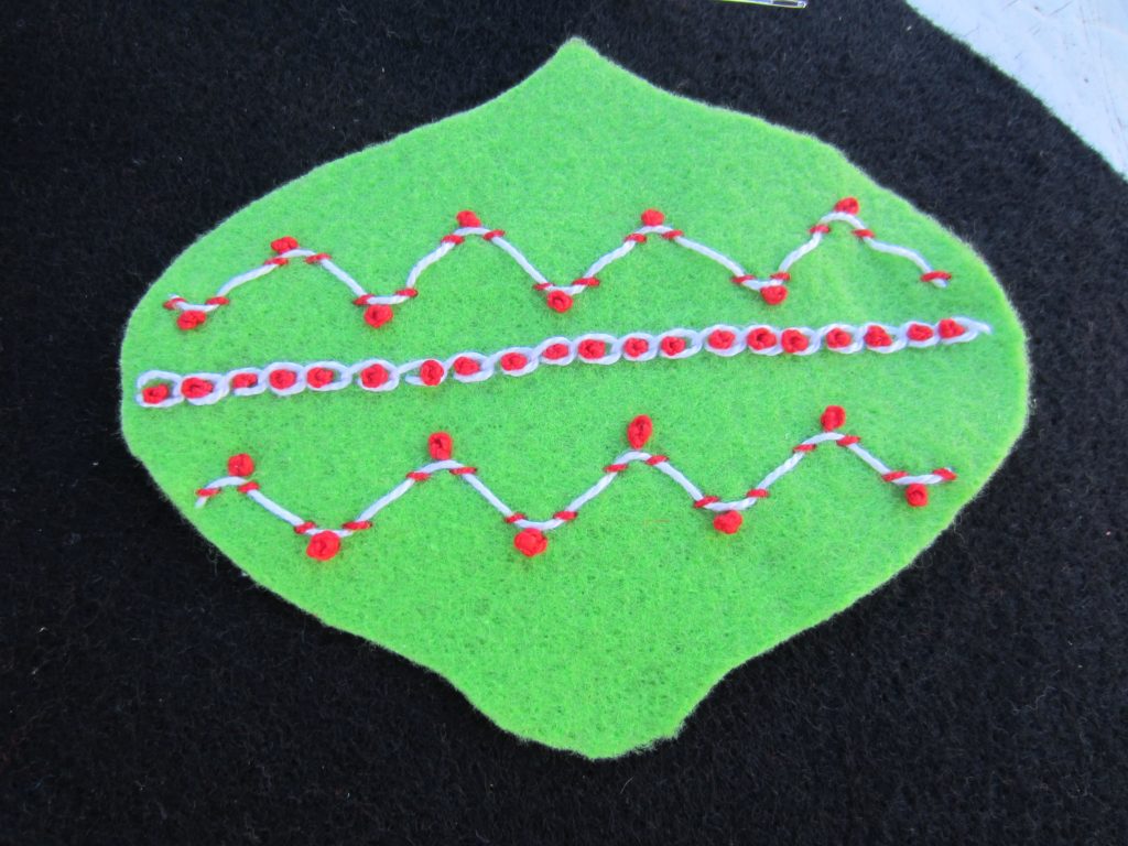 I added more French knots inside each chain of the chain stitch