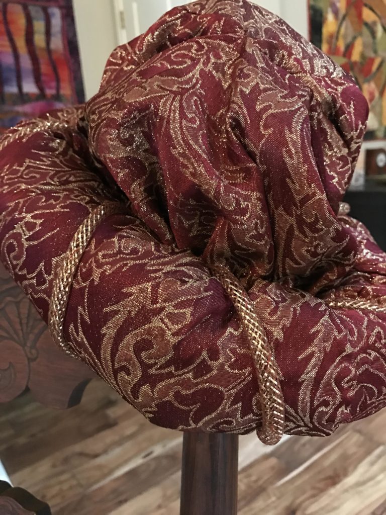 I hand sewed the polyfilled band around the bottom of the hat