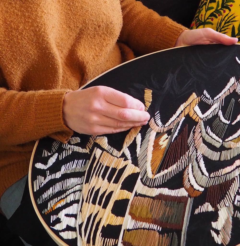 Beth Hoyes working on Black Francolin Feathers in an 18-inch hoop