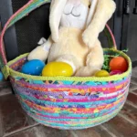 fabric coil easter basket on fireplace close up