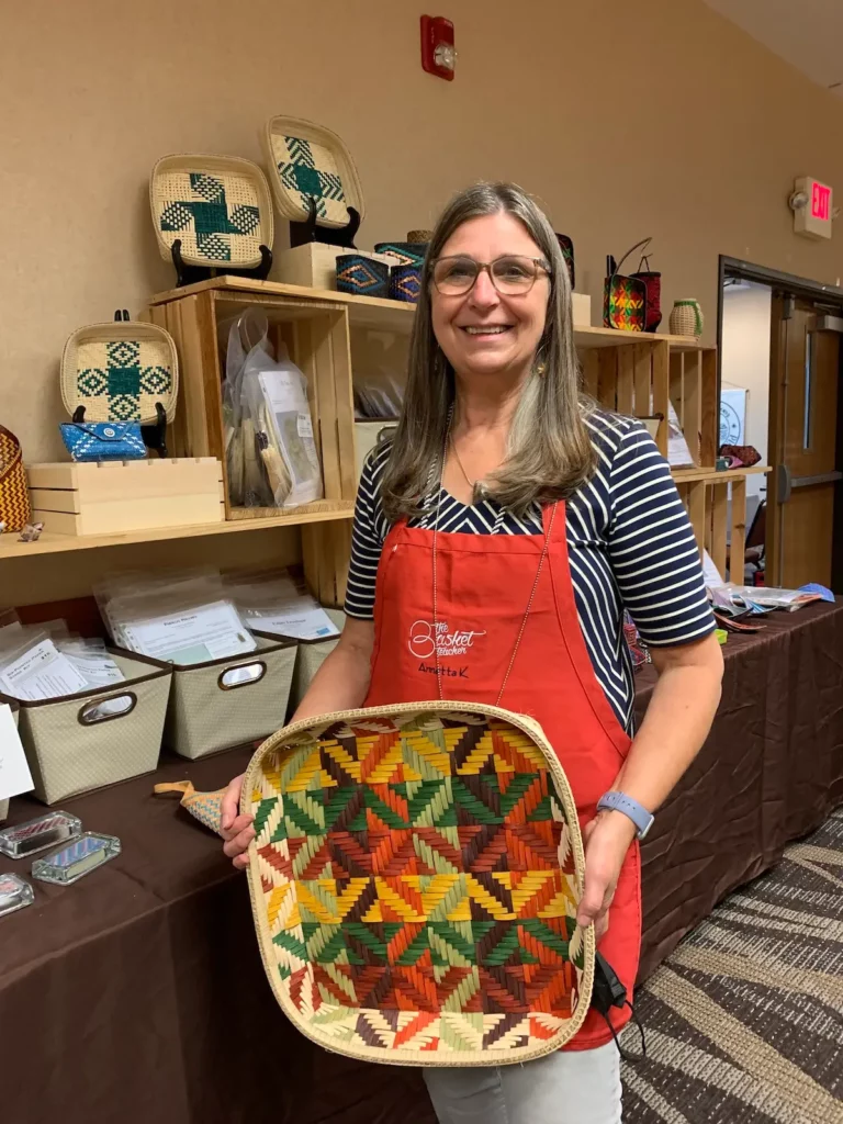 Annetta Kraayeveld with one of her baskets