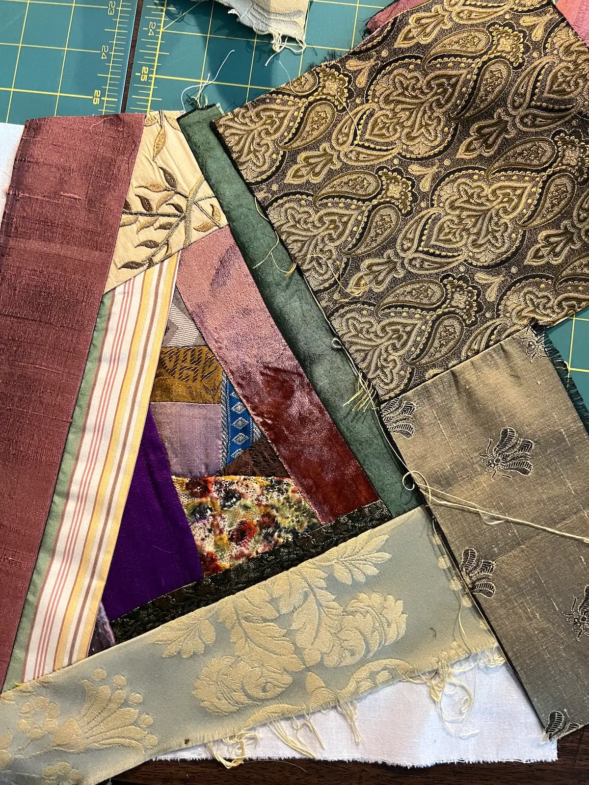 here are two pieces of fabric sewn together to add to the crazy quilt block next