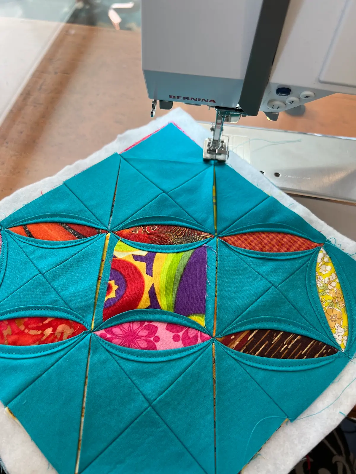 Easy Cathedral window quilt starting to sew the diagonals in the other direction