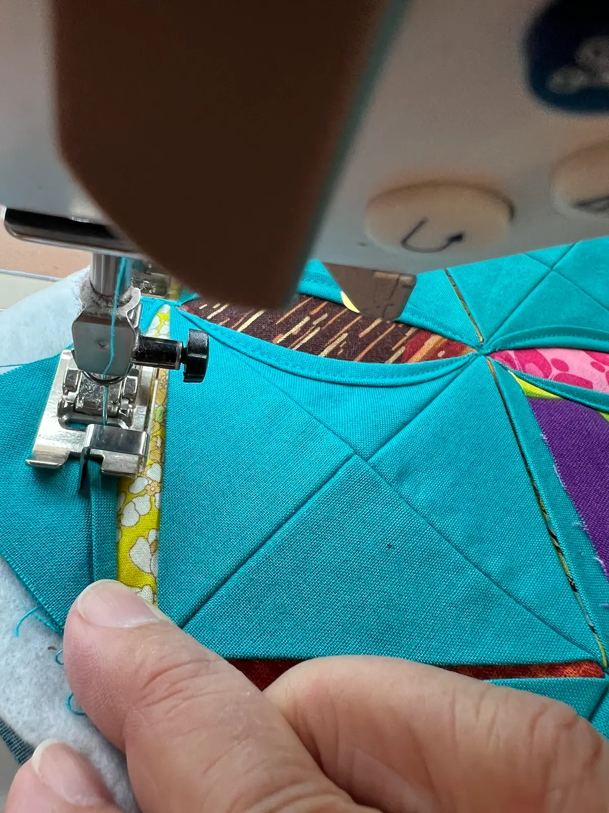 Easy Cathedral window quilt when you get to an edge, pivot and go another direction