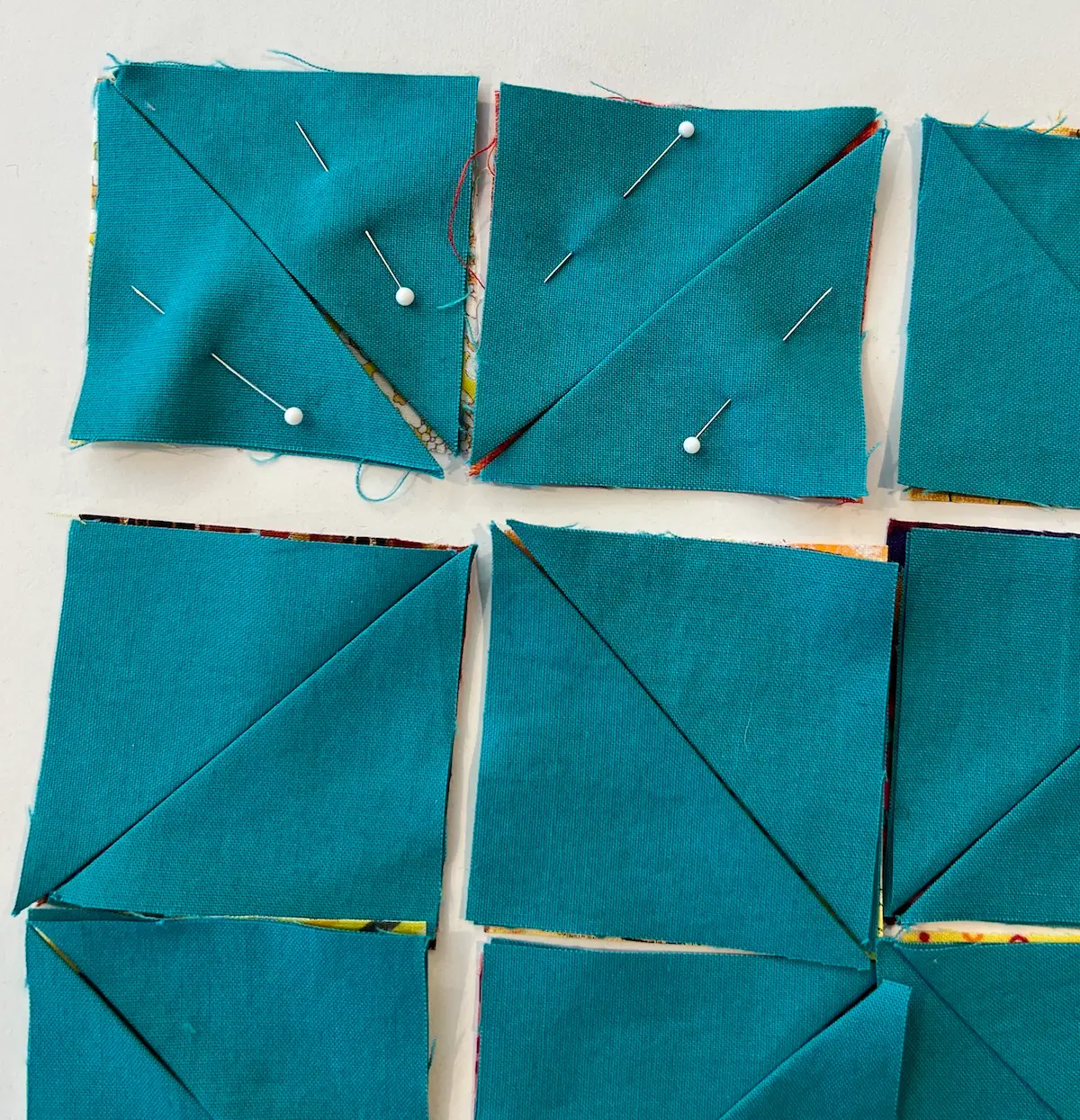 Easy Cathedral window quilt pin the triangles in place