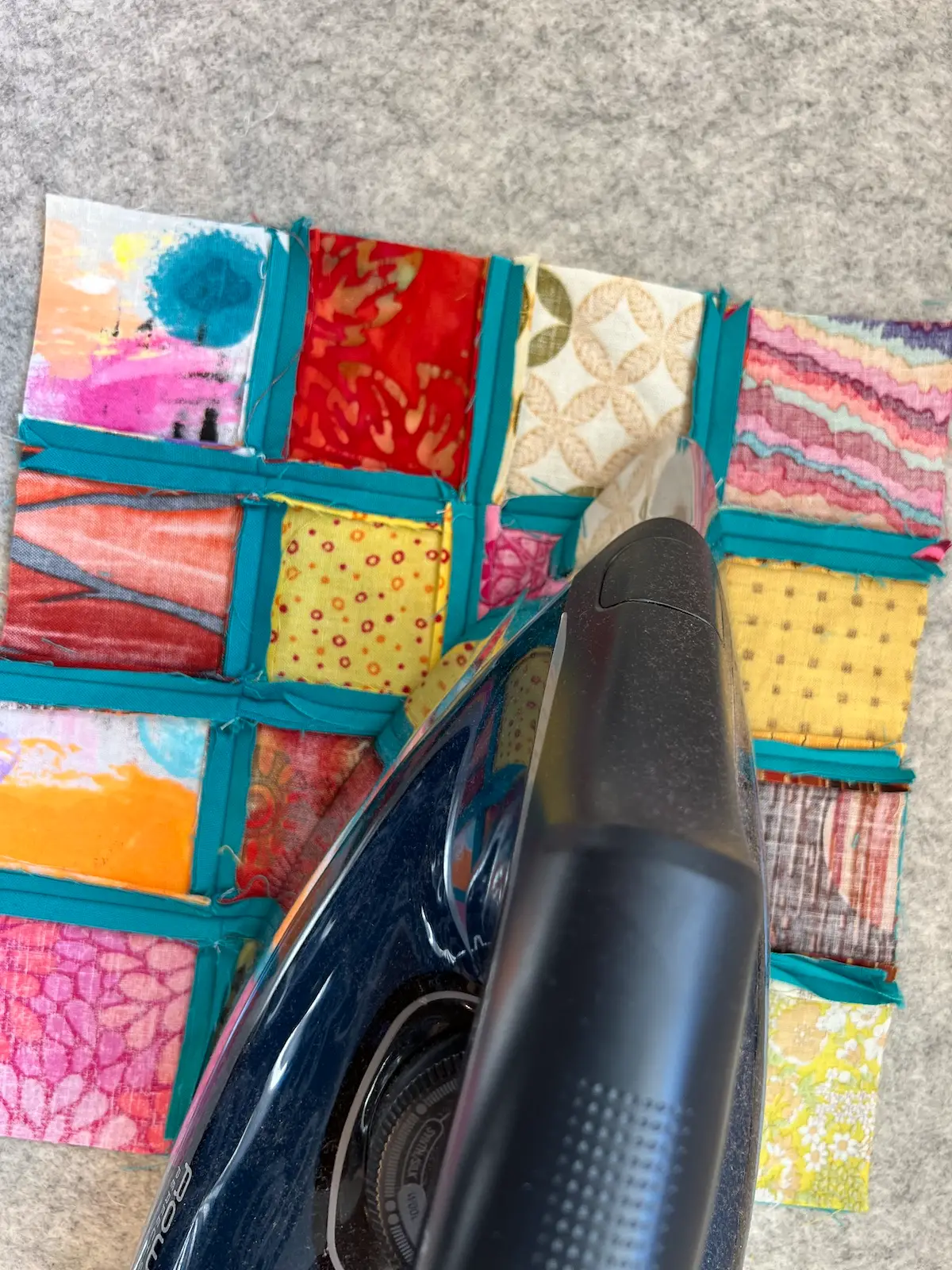 Easy Cathedral window quilt press the seams open on the final piece