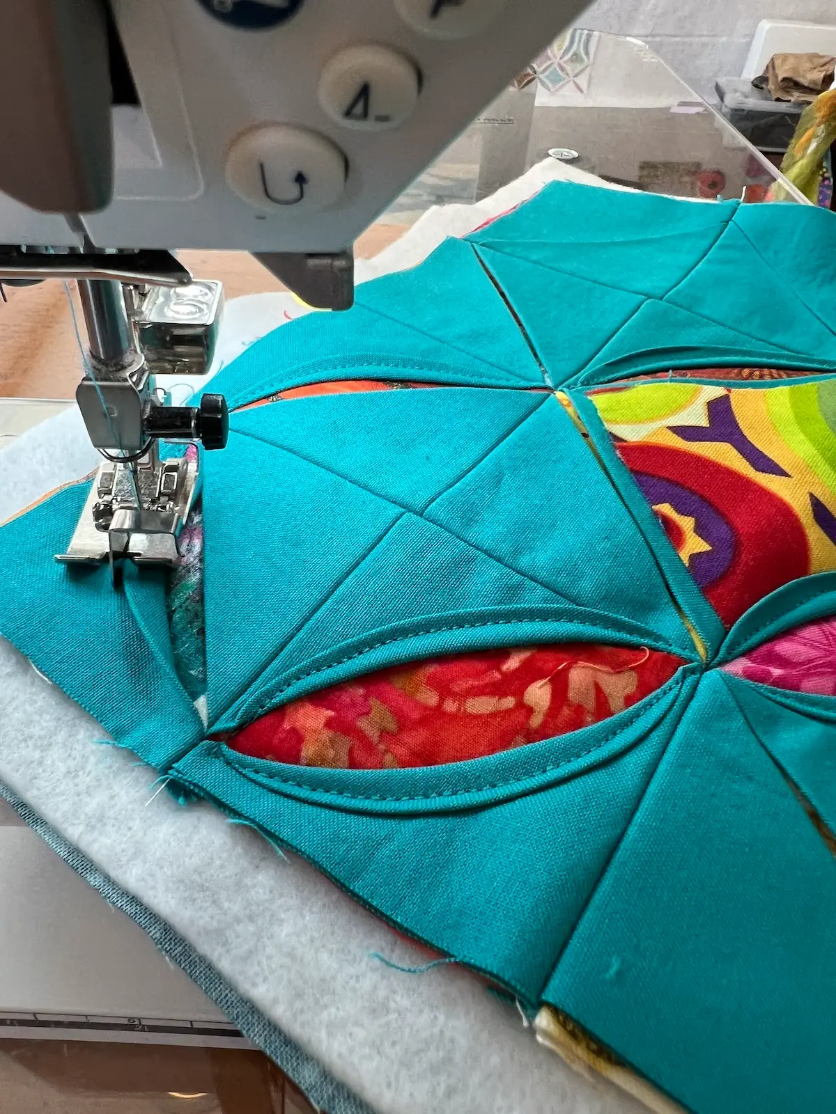 Easy Cathedral window quilt rounding a corner to then turn around and come back the other direction