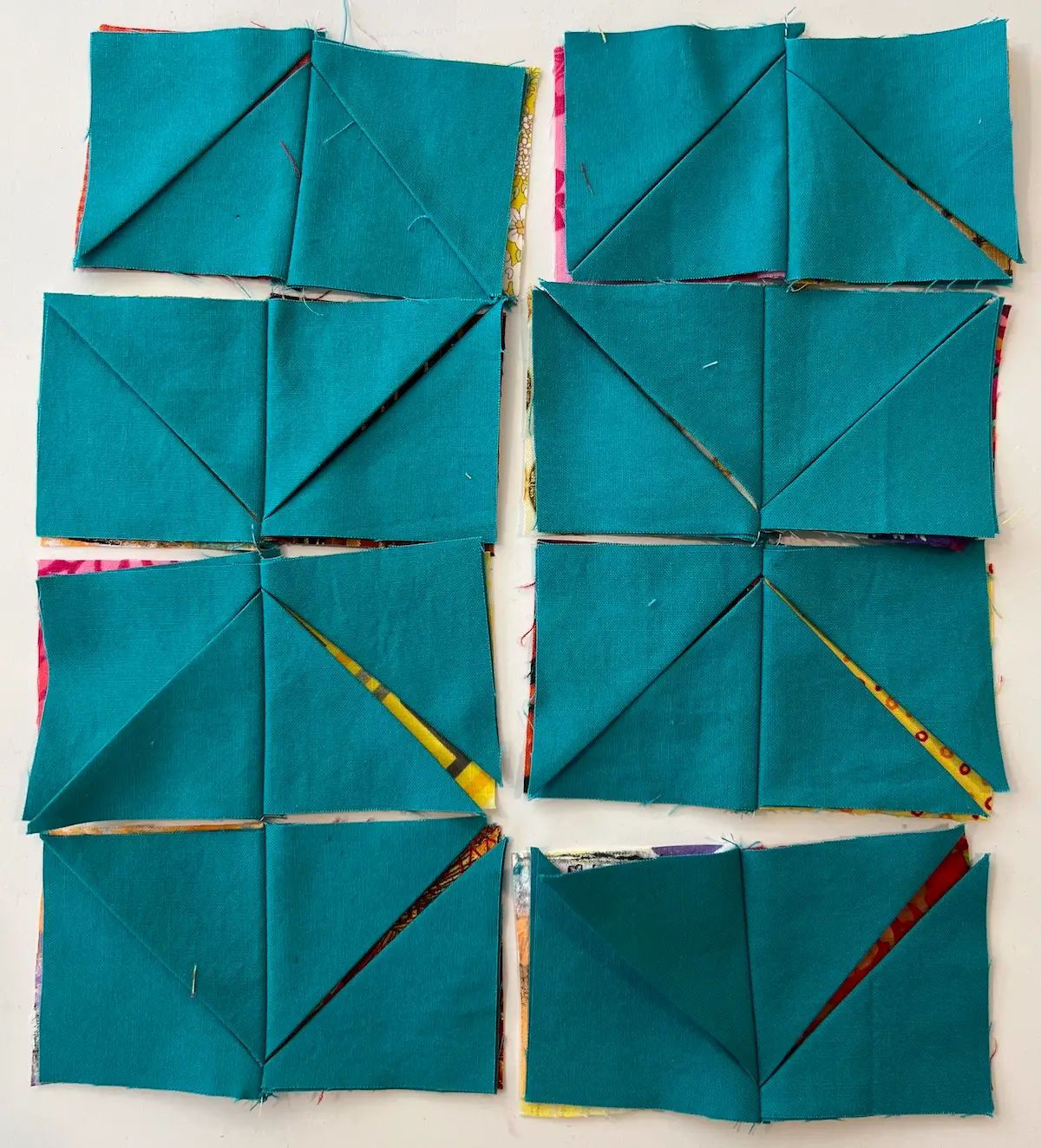 Easy Cathedral window quilt sets of squares sewn together now ready to make them into 4 patches