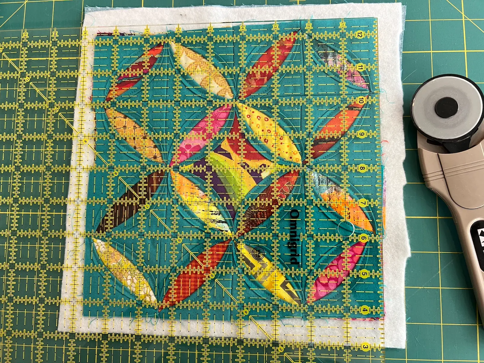 Easy Cathedral window quilt trim up your piece when it is quilted