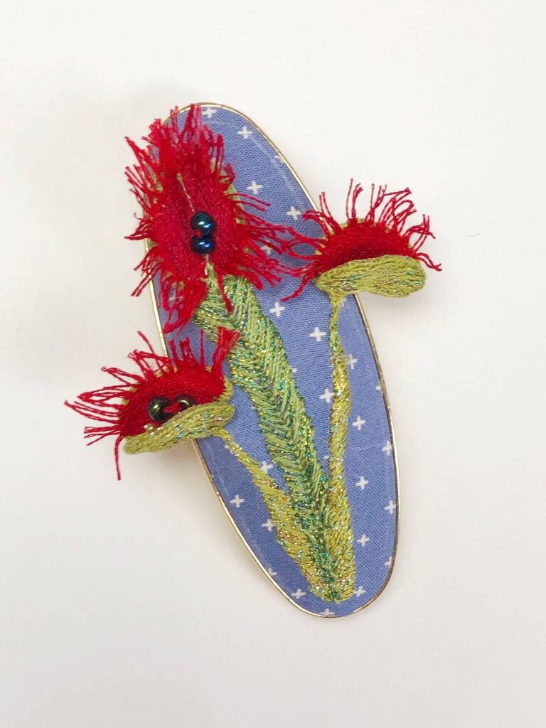 Venus Fly Trap barrette with stumpwork embroidery by Melissa Galbreath