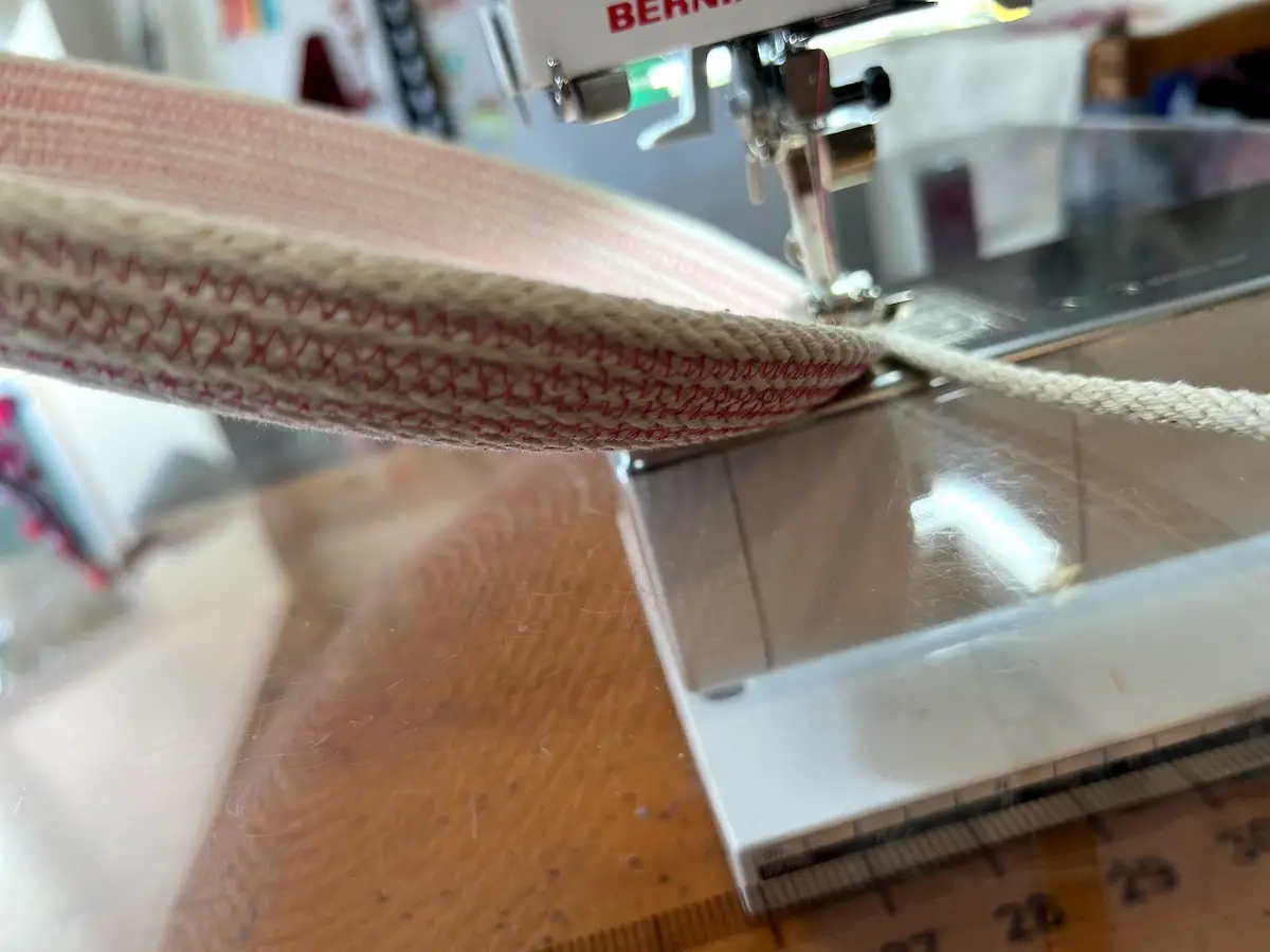 Gently hold the basket up to form the edge for a rope basket - pink