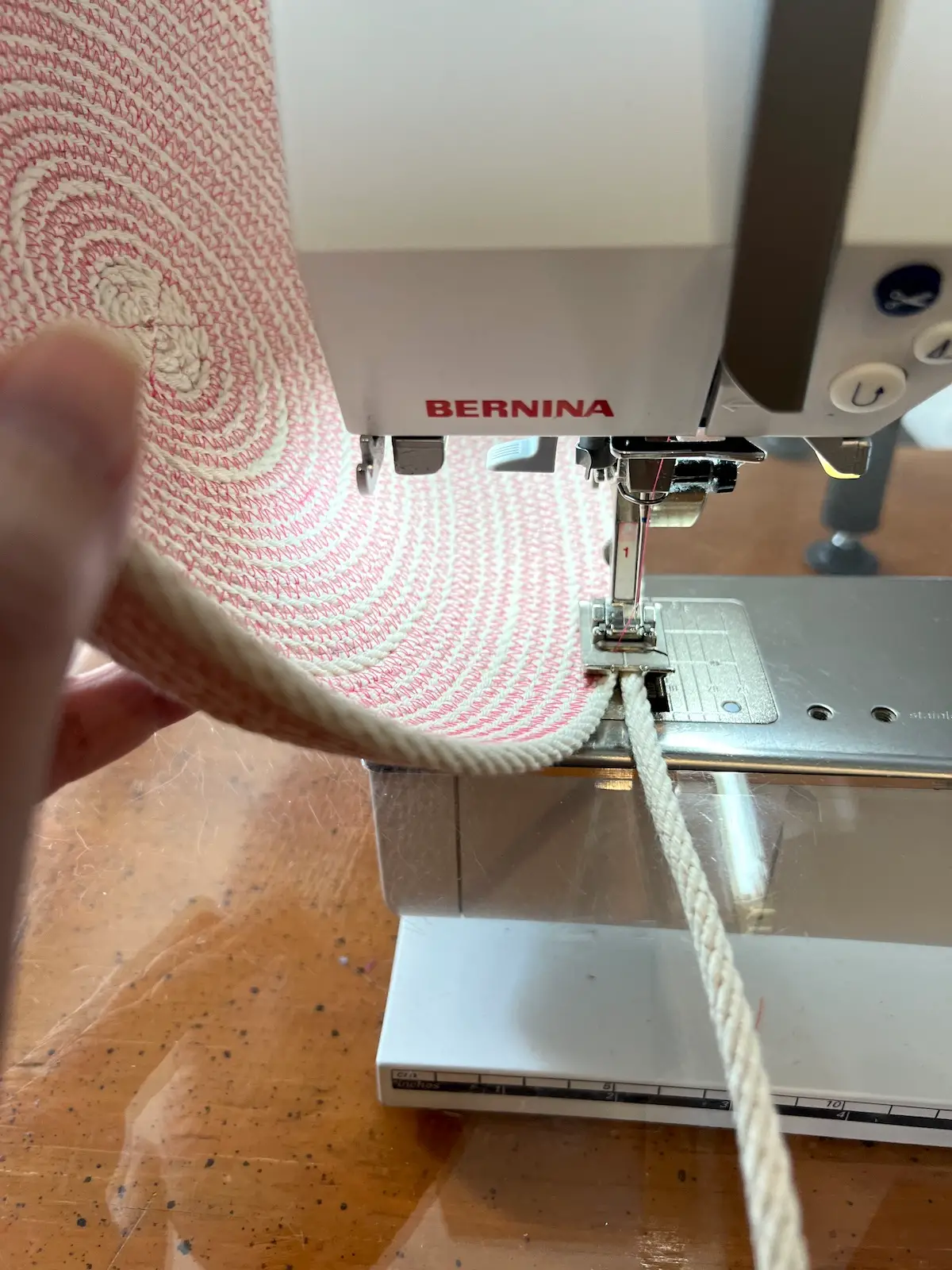 Forming the sides for the pink rope basket