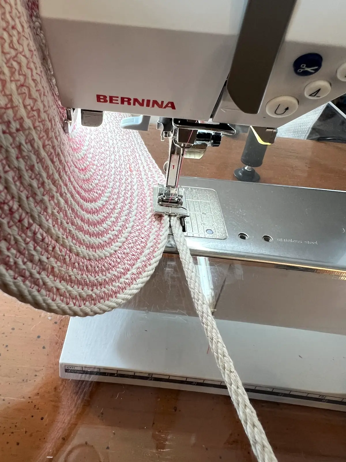 Beginning to form the sides for the pink rope basket