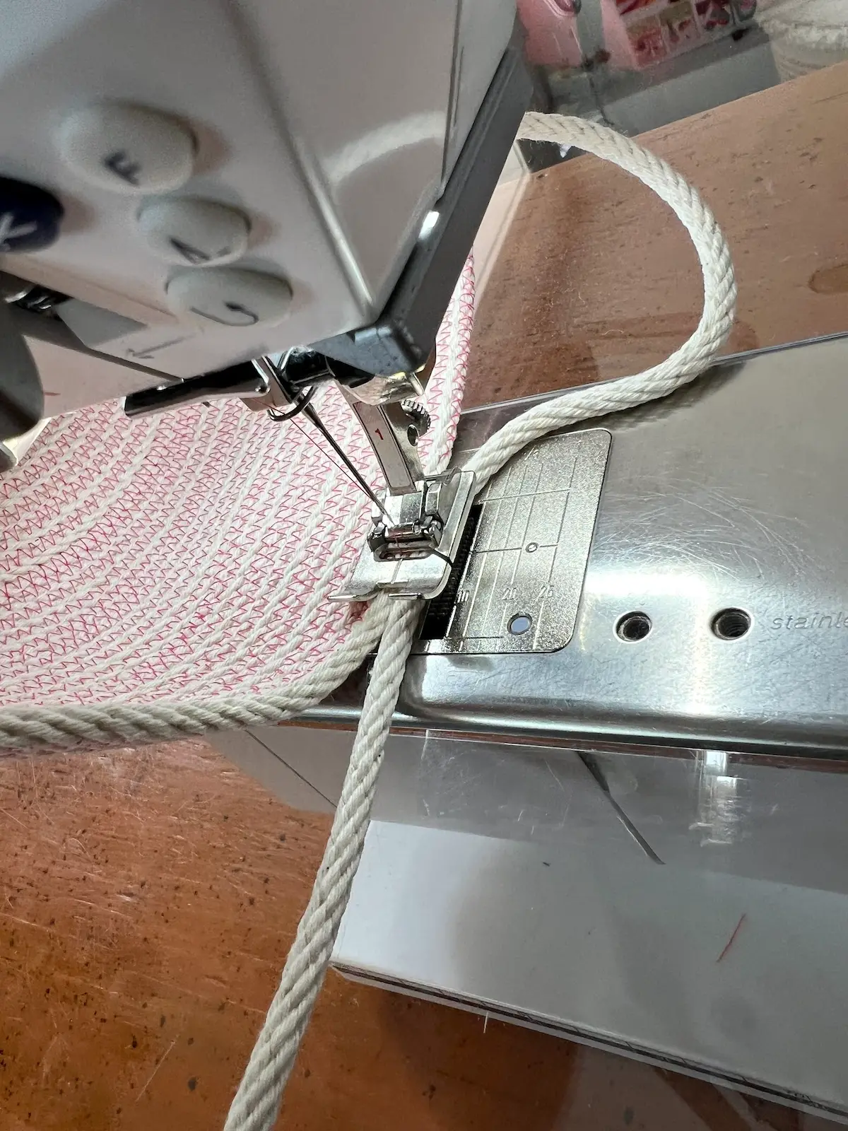 Stitching the other side of the loop for the pink rope basket handle