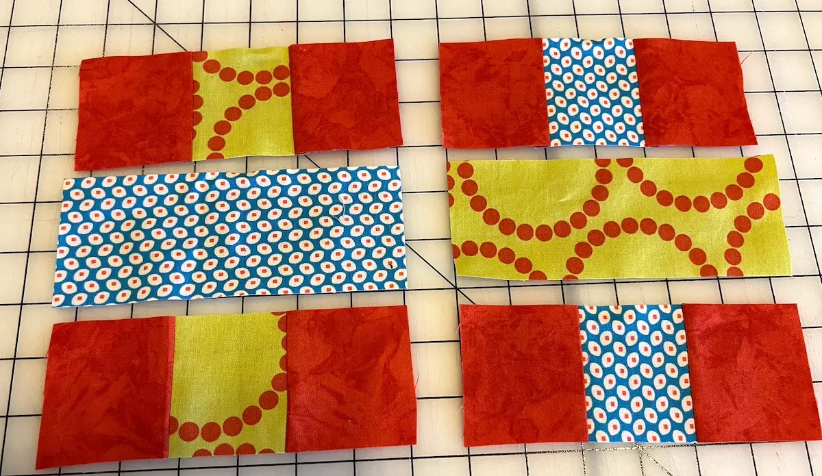 The two blocks used in the 7 patch weave block laid out