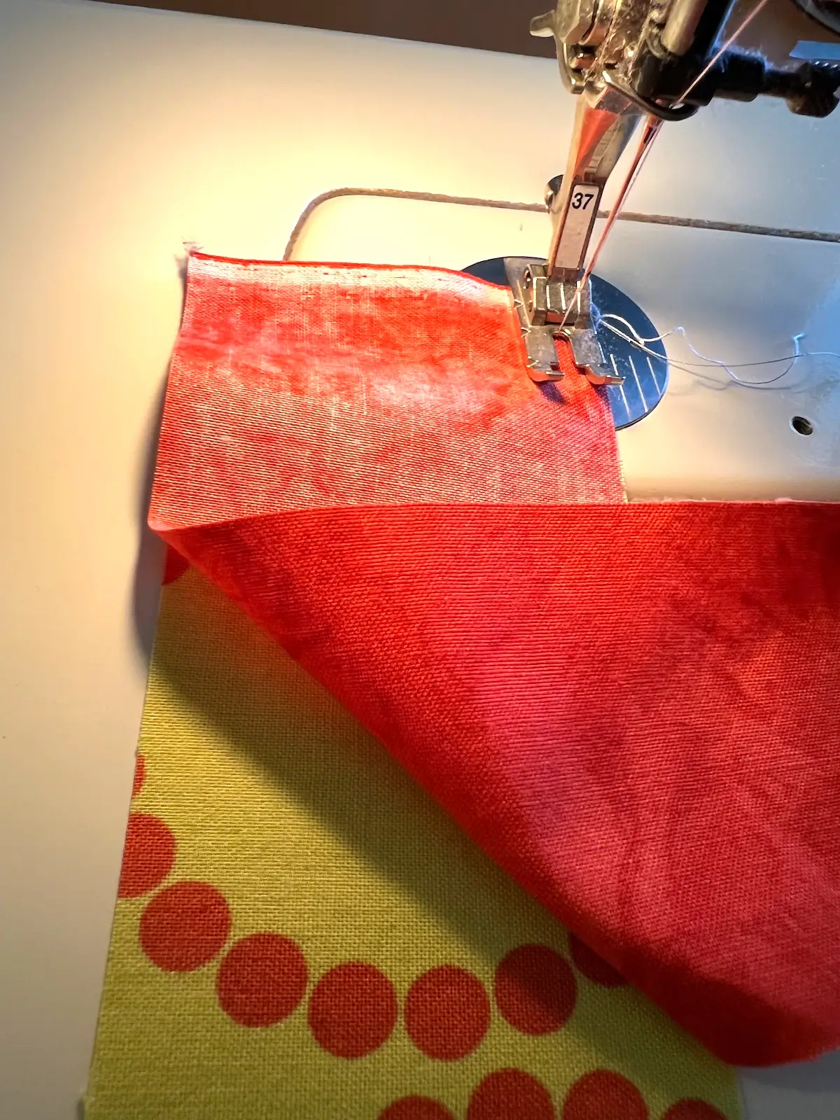 Sewing the strips together for the 7 patch weave quilt