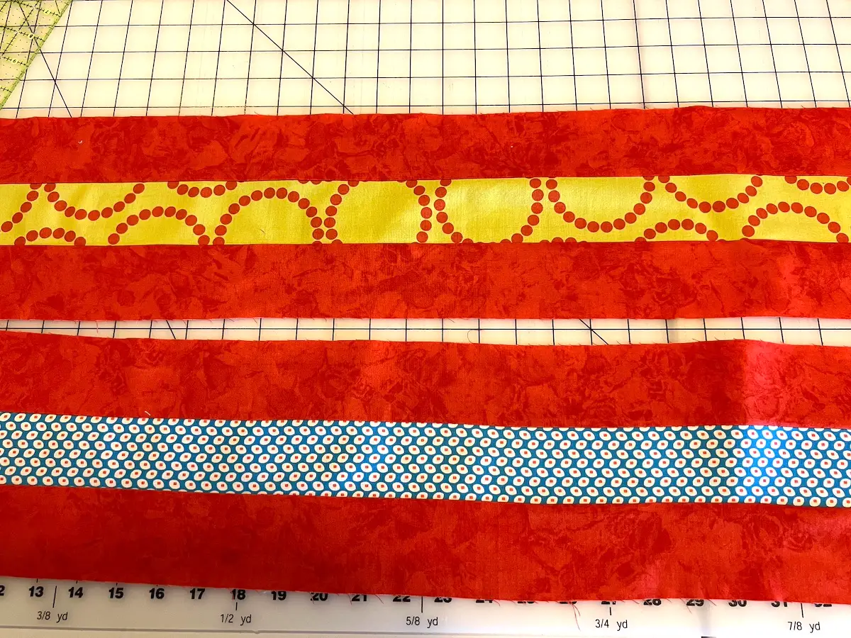 Strip sets sewn together for the 7 patch weave block