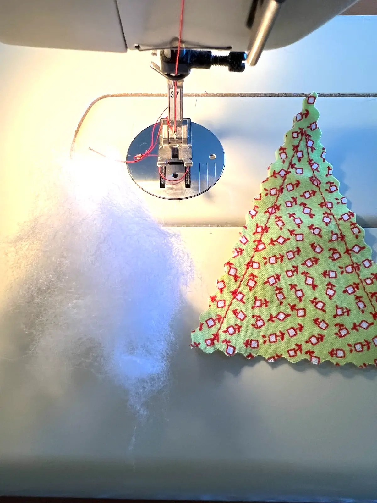 Add a bit of polyfill to the inside of the christmas tree ornament