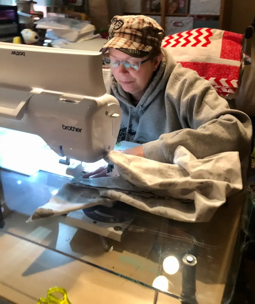 Monique Arnold daughter sewing
