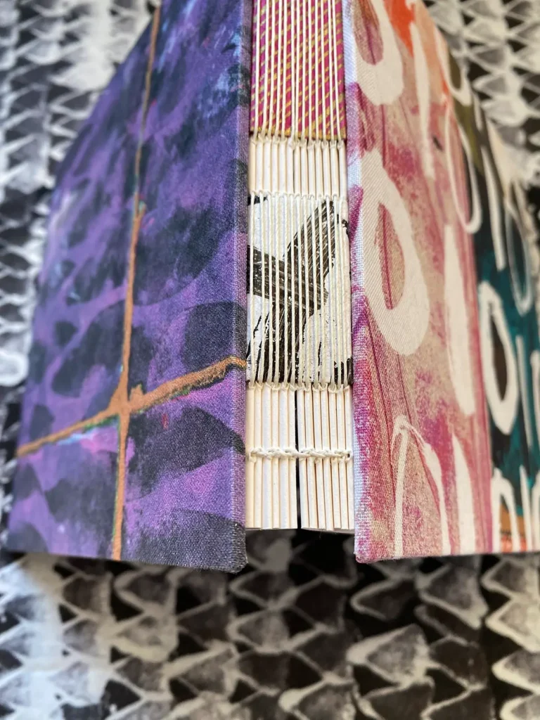 Showing the hand binding on a book made by e bond