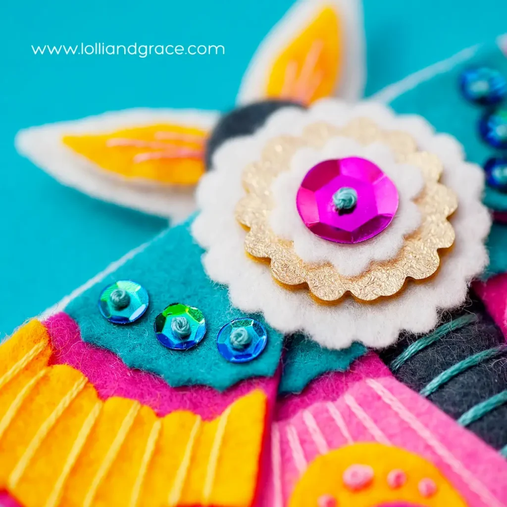 Detail of butterfly ornament by Anne Oliver