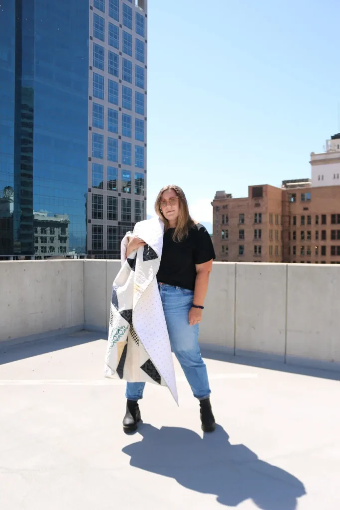 Ashelyn Downs with her quilt Right Turn Only