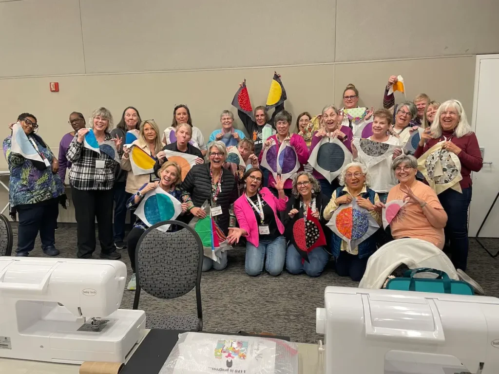 Jen Wagner with a class of students doing circles