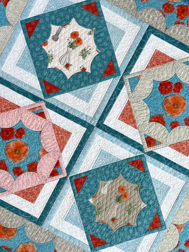 Red and turquoise quilt details by Jen Wagner