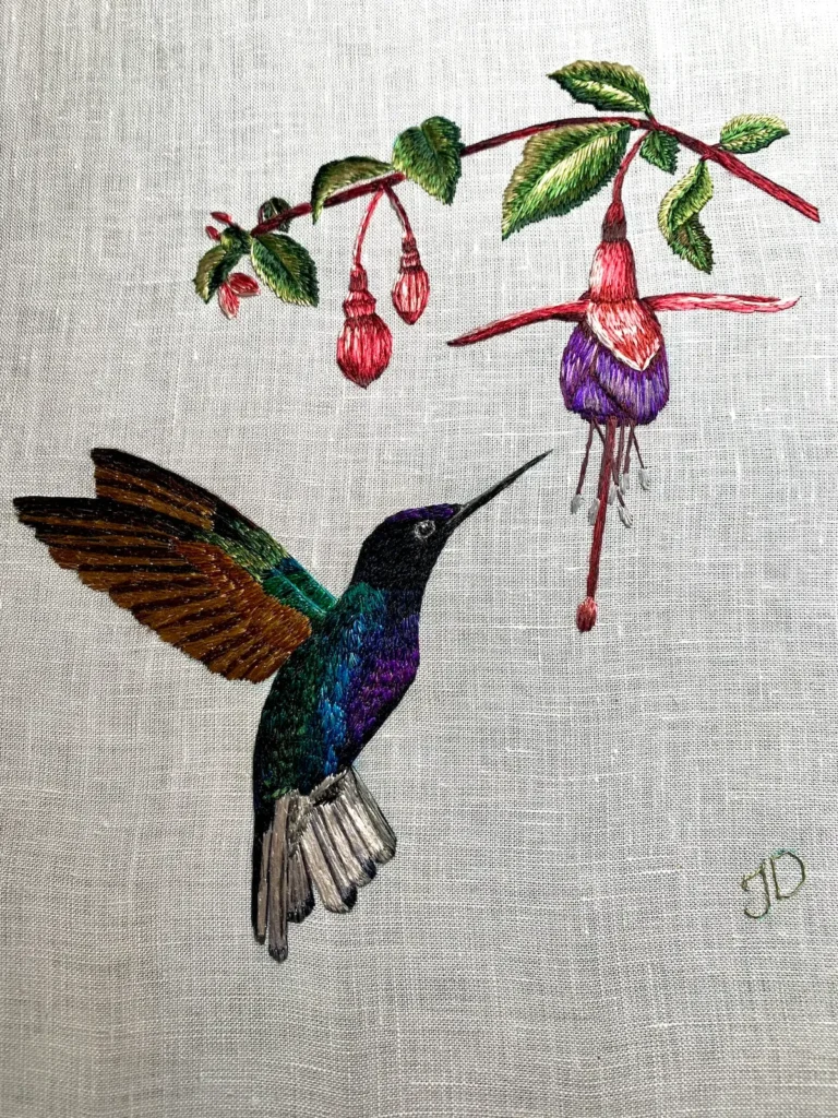 Hummingbird and fuchsia bloom embroidery by Jessica Devin
