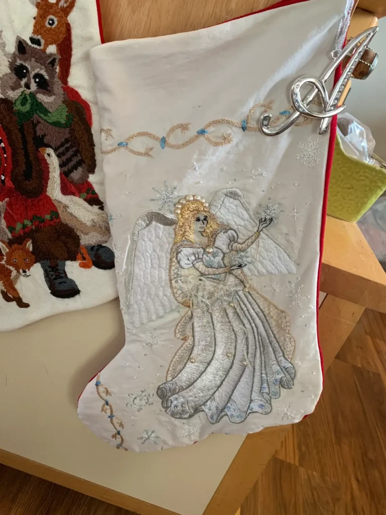 Angel embroidered stocking by Jessica Devin