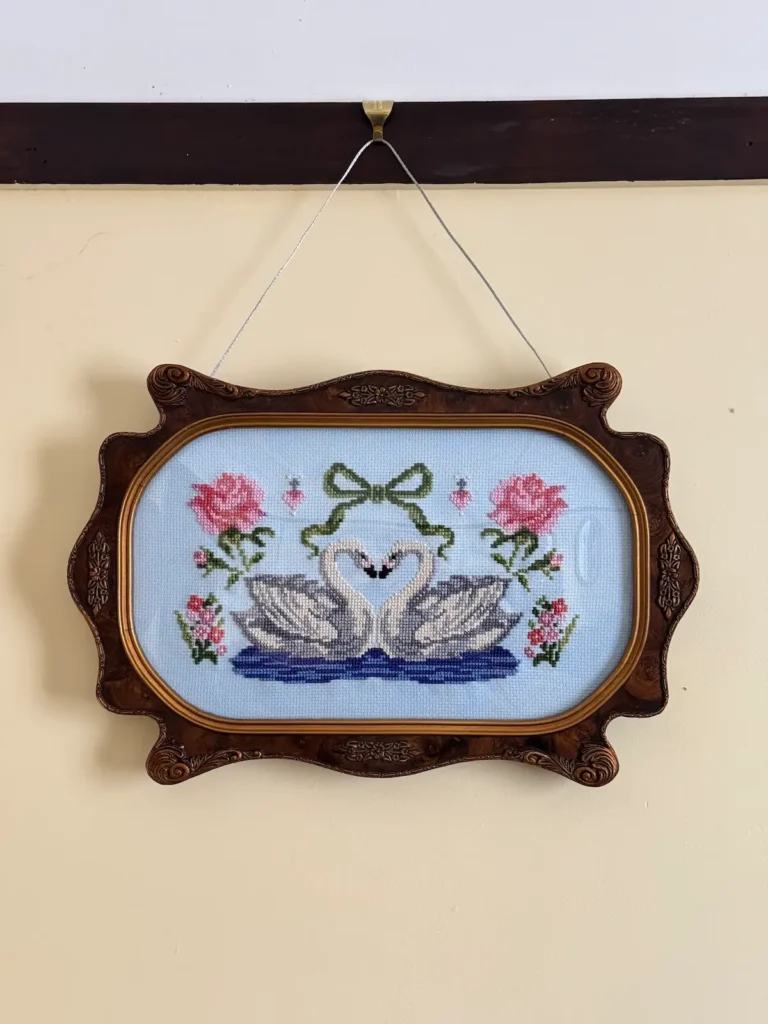 Crossstitch swans by Maddie Jones