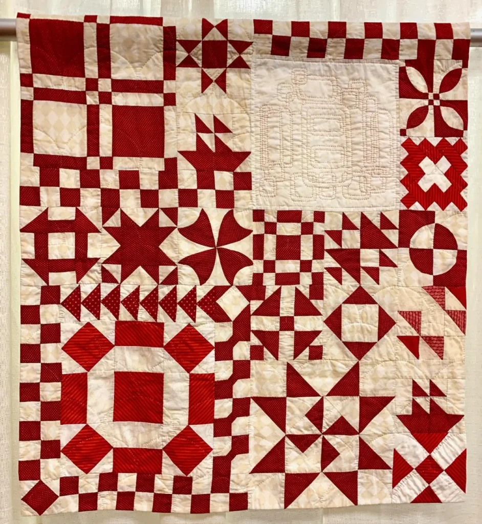 Red and Offwhite quilt sample for Empty Spools Seminar on How to Make a Handmade Quilt by Pattie Klimek