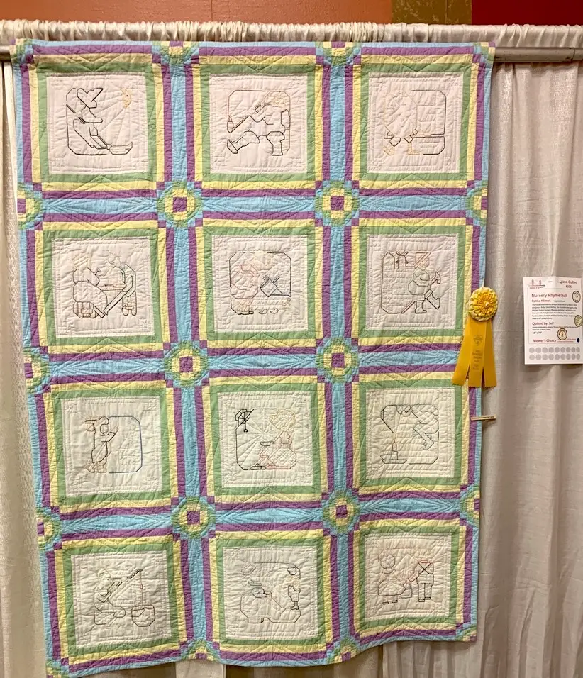 Ruby Short McKim Nursery Rhyme quilt hand pieced and quilted, designed by Pattie Klimek