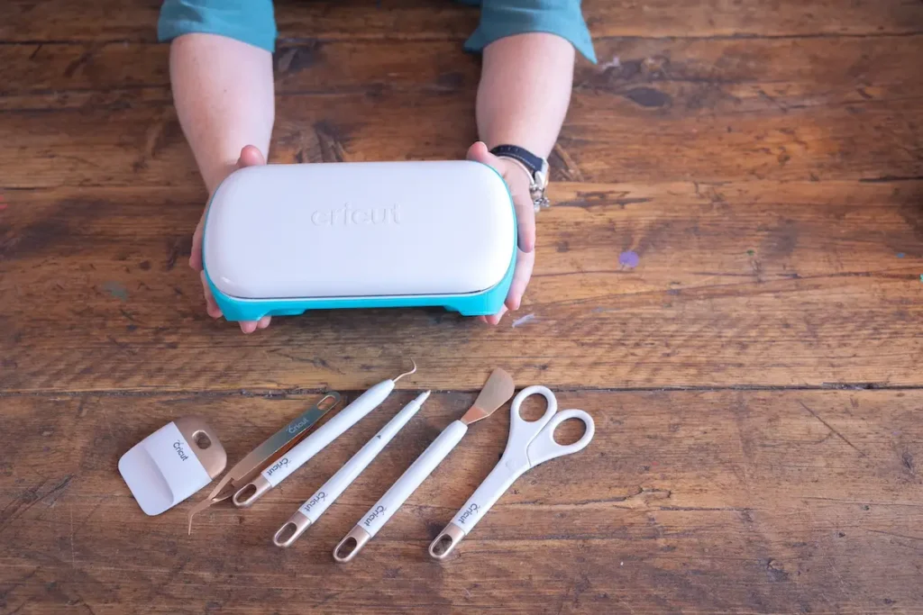 Paula Milner showing her little cricut printer