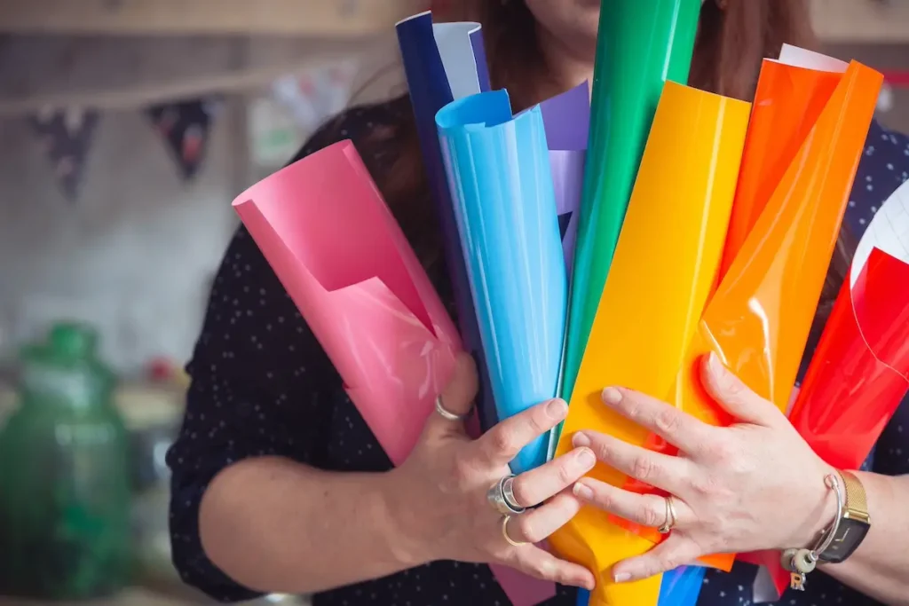 Paula Milner with vinyl to cut on her cricut