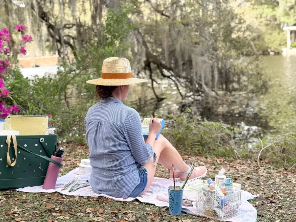 Sarah Jane Tart painting by a river