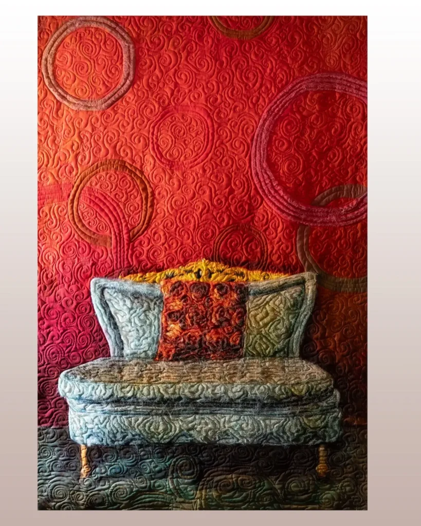 Chair with Orange Pillow art quilt by Tasha Owen