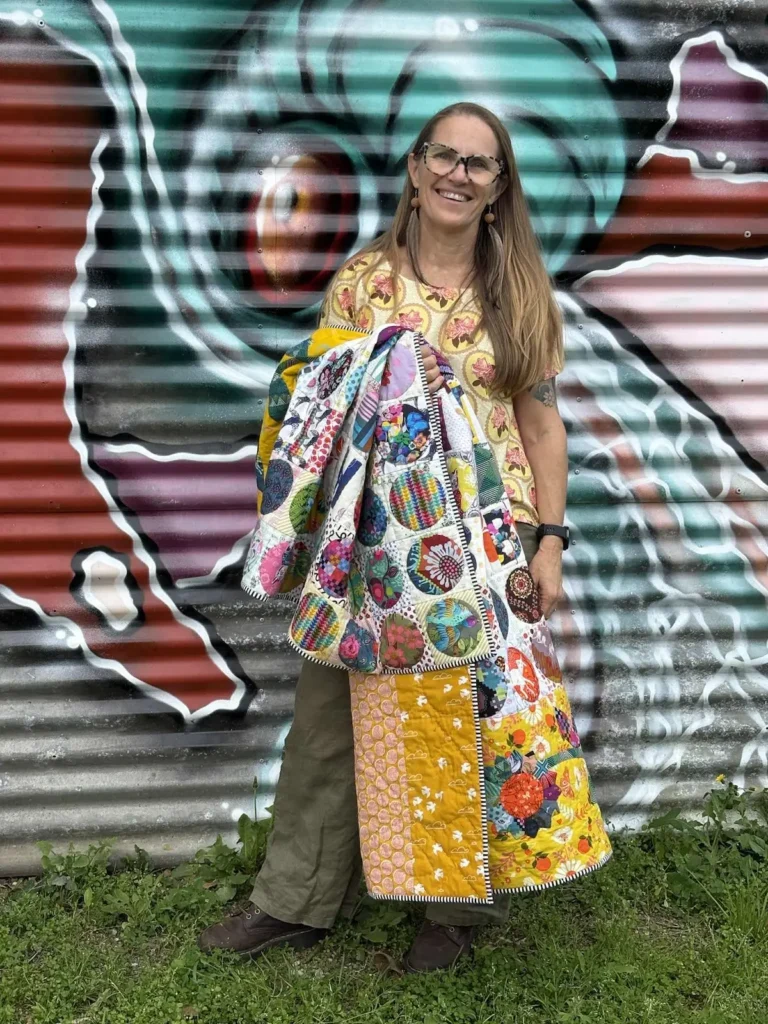 Barbie Mitchell with her HLV quilt