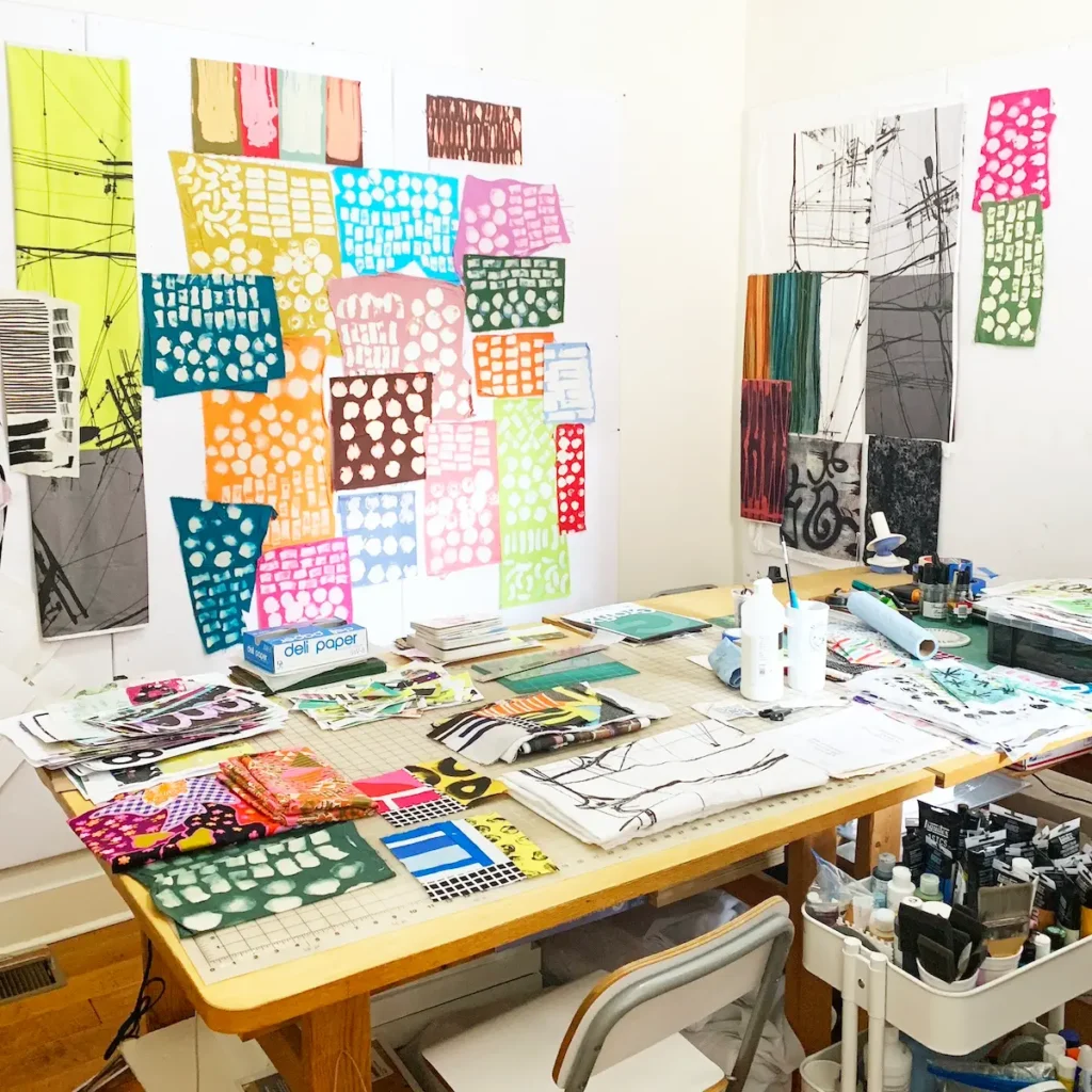 Drew Steinbrecher showing design wall