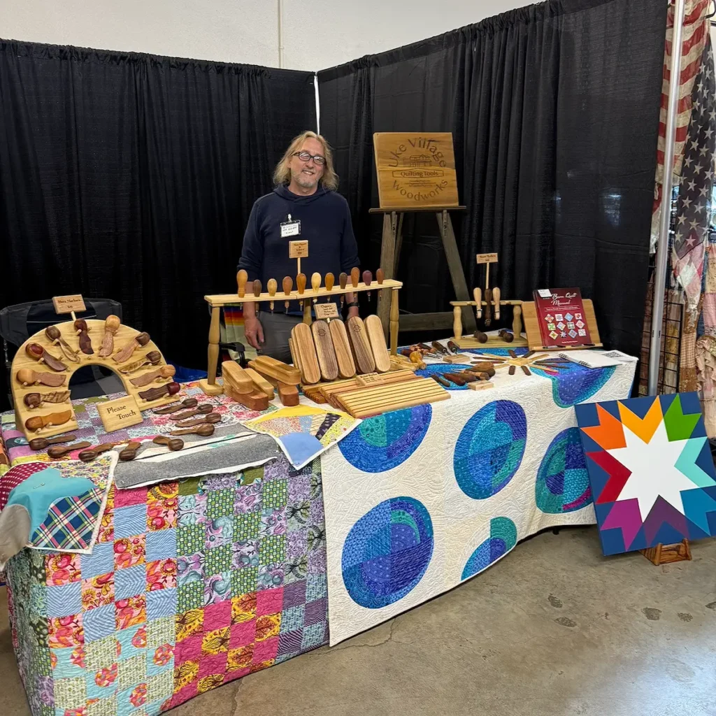 Michael Jacques at a booth