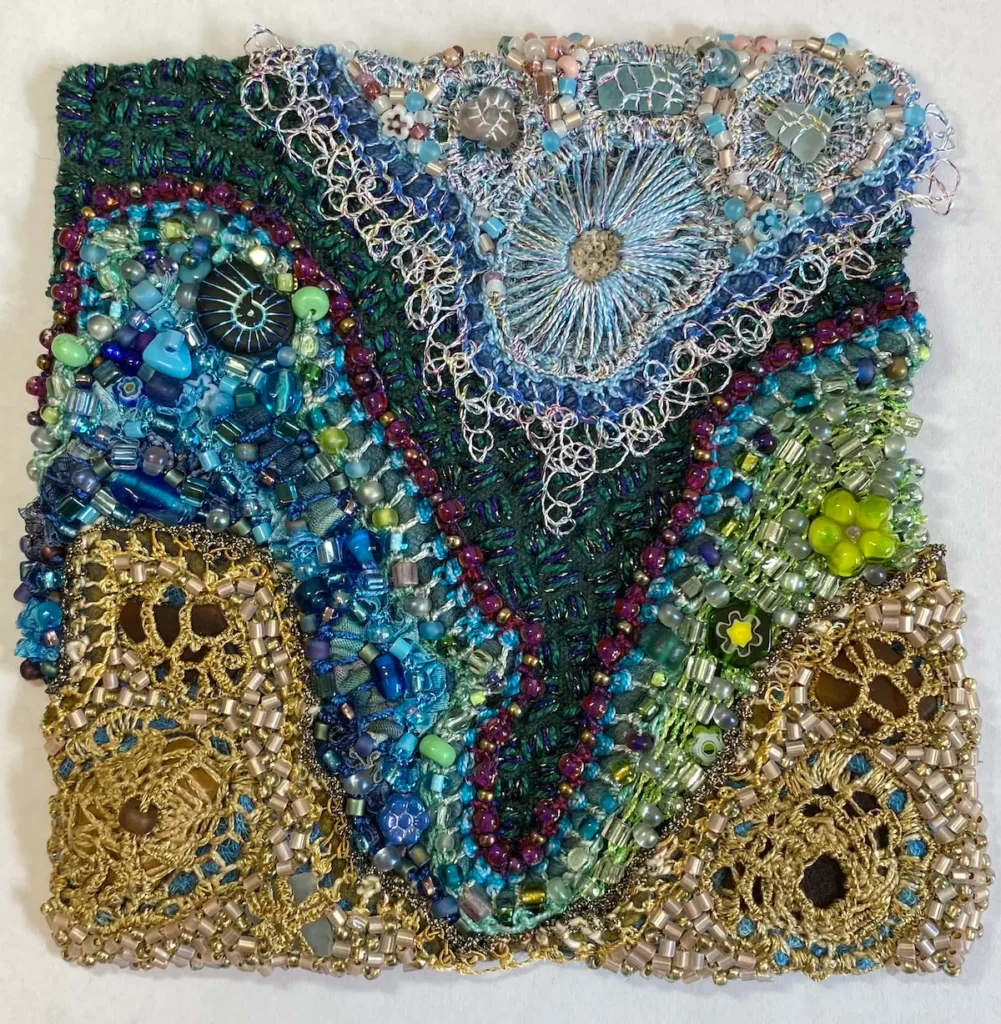 Primordial beaded fiber art by Julie Booth
