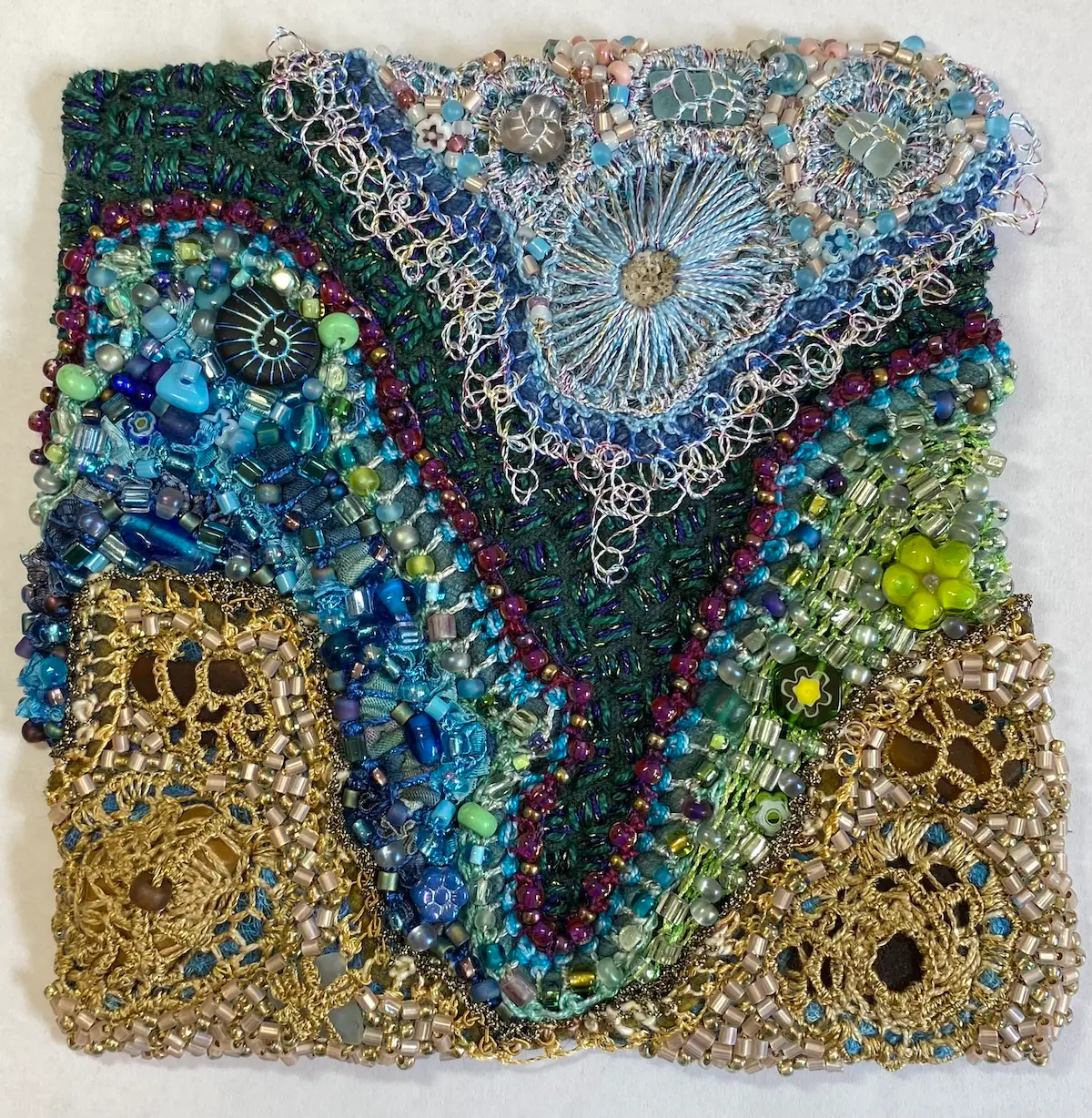 Primordial beaded fiber art by Julie Booth