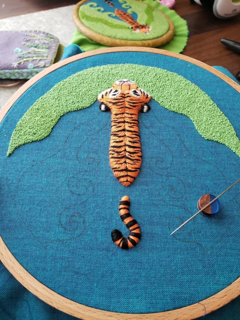 Tiger embroidery in progress by Laura McGarrity